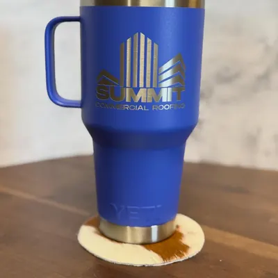 Custom laser-engraved Summit Commercial Roofing Yeti tumbler