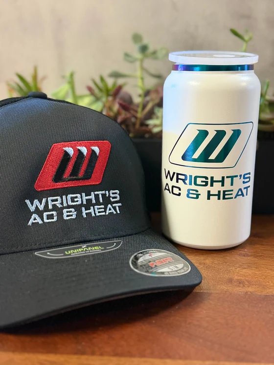 Custom embroidered hat and printed tumbler with Wright's AC & Heat logo