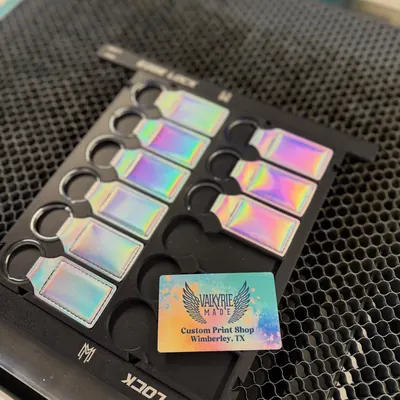 Holographic laser-engraved keychains made by Valkyrie Made
