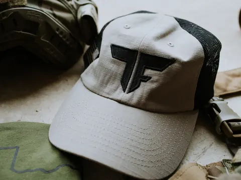 Custom embroidered hats — trucker, snapback, and dad hats