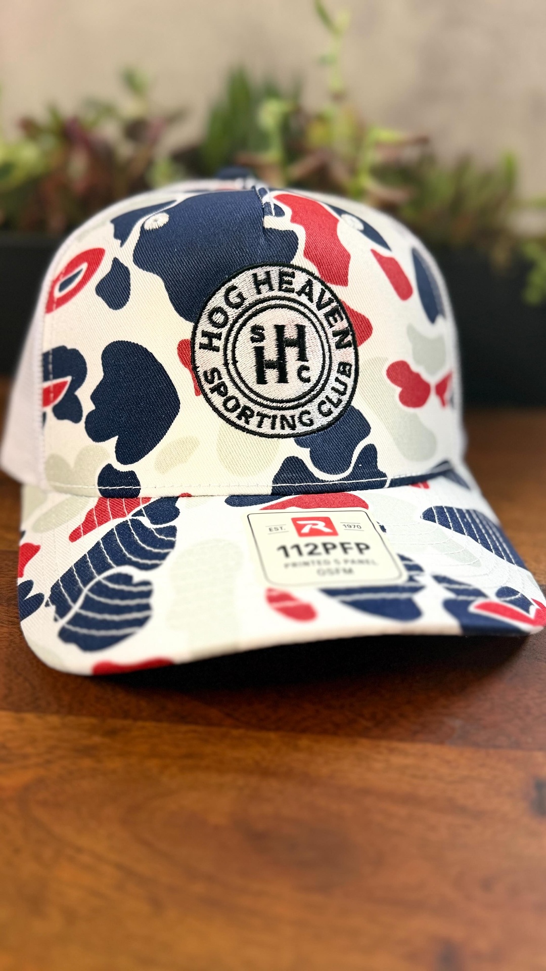 Hog Heaven Sporting Club custom embroidered camo trucker hat