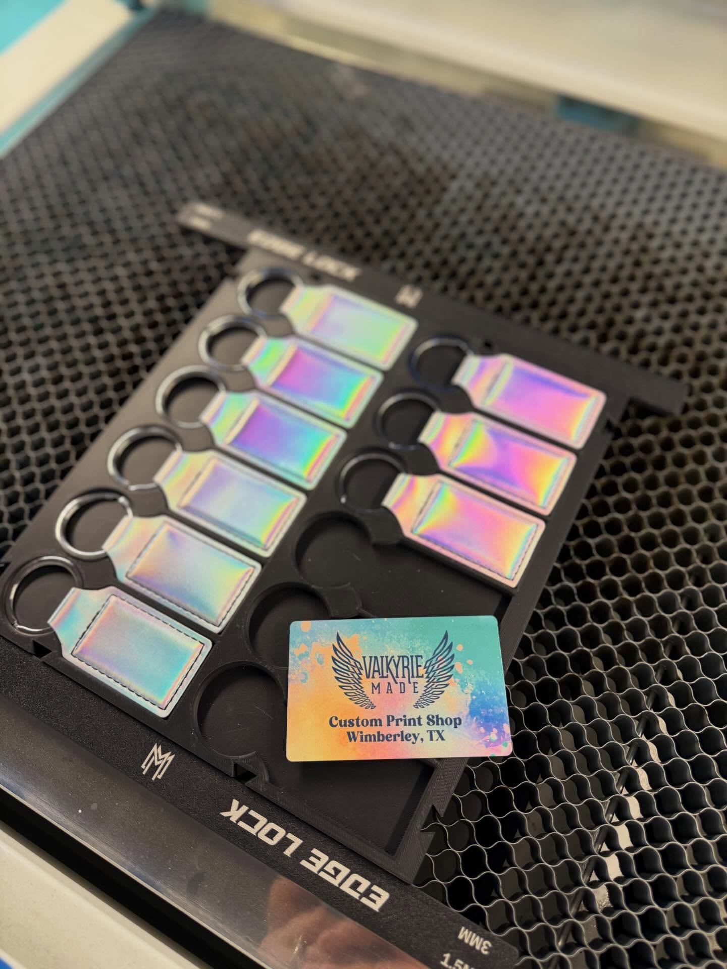 Holographic laser-engraved keychains made by Valkyrie Made